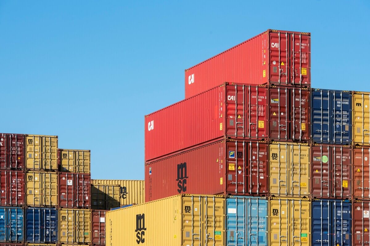 Shipping containers on a vessel that has been delayed because of supply chain disruption