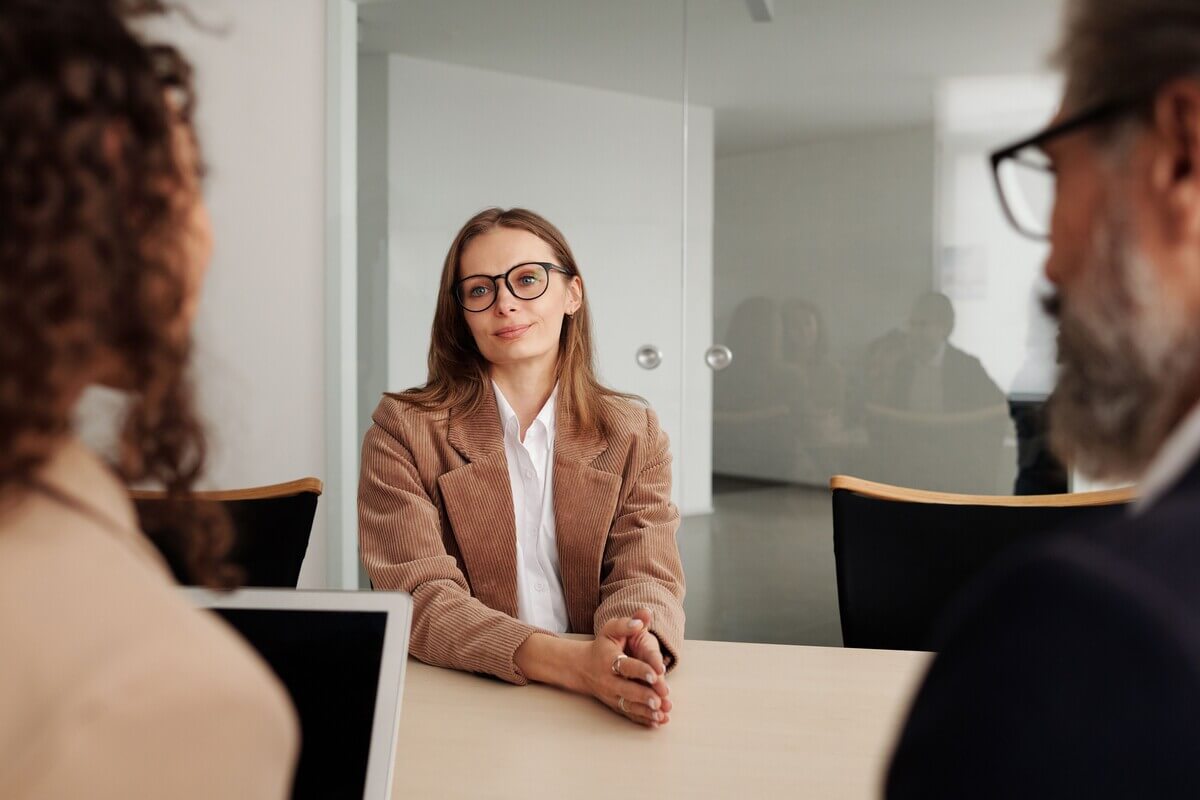 Young woman answering common HR job interview questions